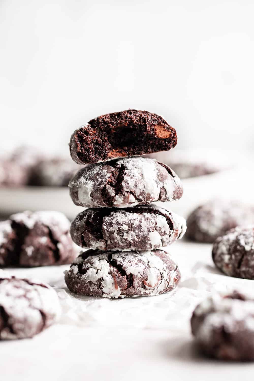 These easy paleo chocolate crinkle cookies are sure to become a holiday baking favorite! They have double the chocolate and a chewy brownie-like inside. Gluten free, grain free and dairy free. #paleo #glutenfree #cleaneating #christmascookies #christmas #paleobaking