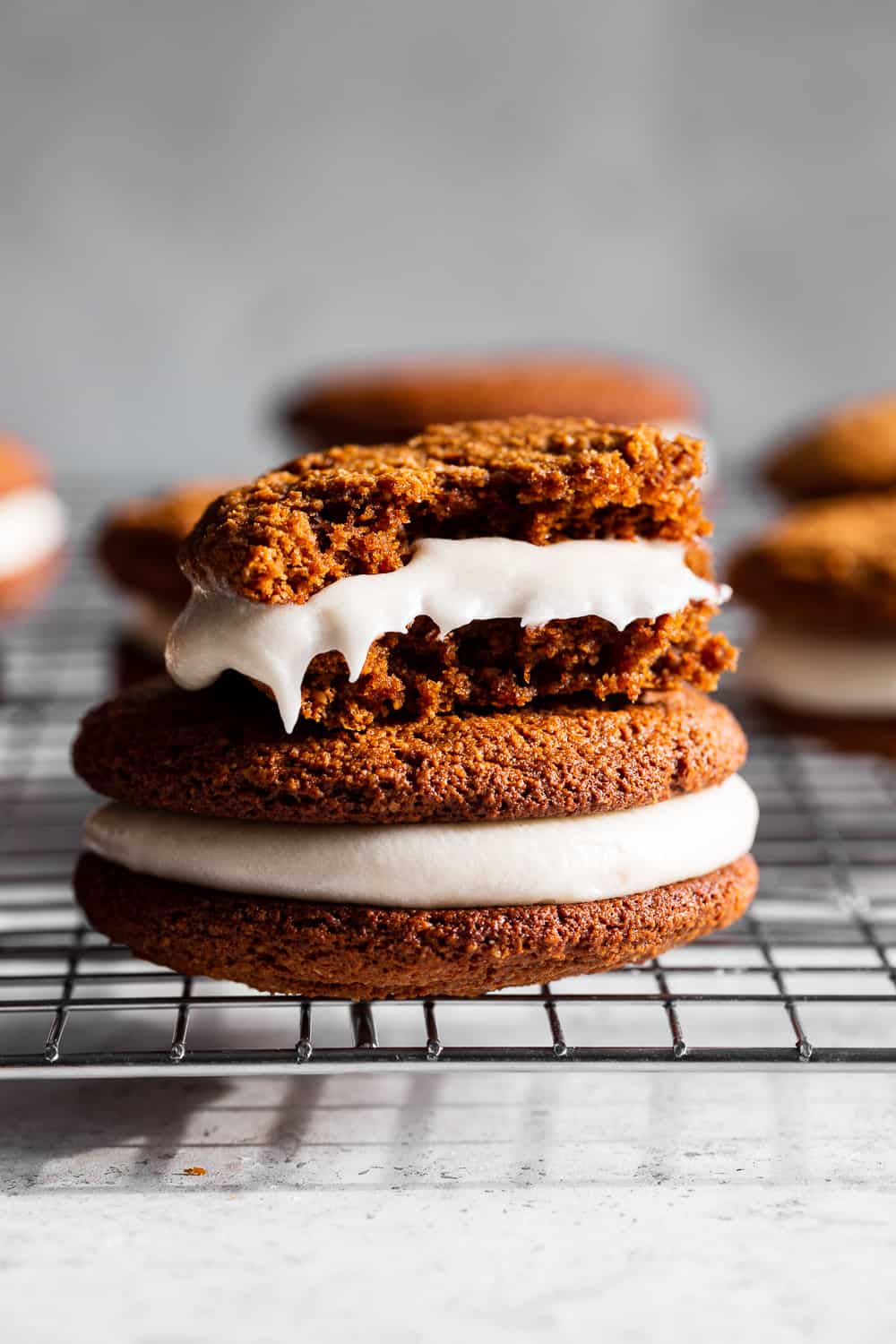 These grain free Gingerbread Whoopie Pies have loads of molasses flavor with warm spices and a soft cream cheese filling with a dairy free option. They’re gluten free, paleo friendly, easy to prepare and an extra special treat for the holiday season! #paleo #grainfree #paleobaking #glutenfree #glutenfreebaking