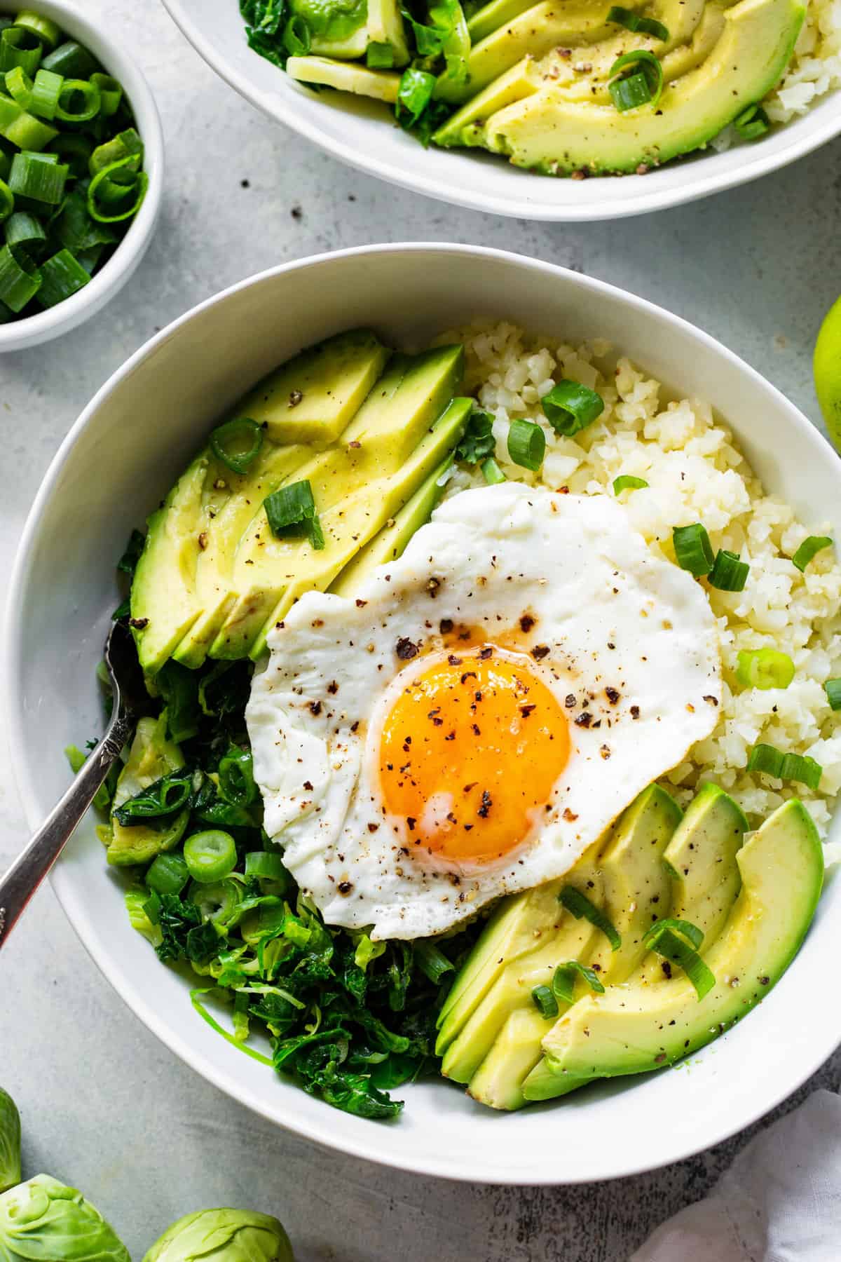 https://www.paleorunningmomma.com/wp-content/uploads/2022/08/green-breakfast-bowls-2-scaled.jpg