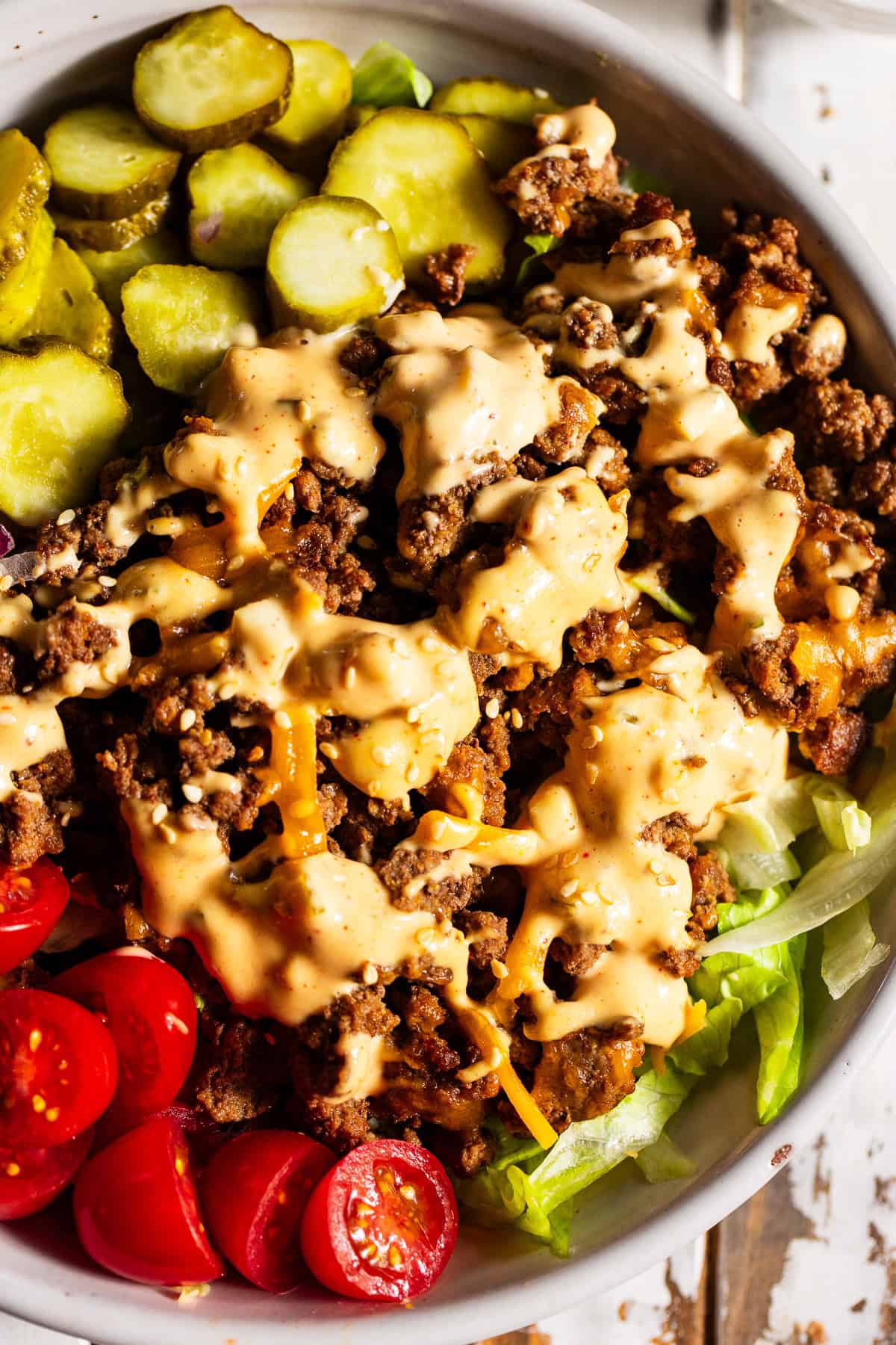 High protein Big Mac bowls with ground beef, cheddar cheese, pickles and special sauce