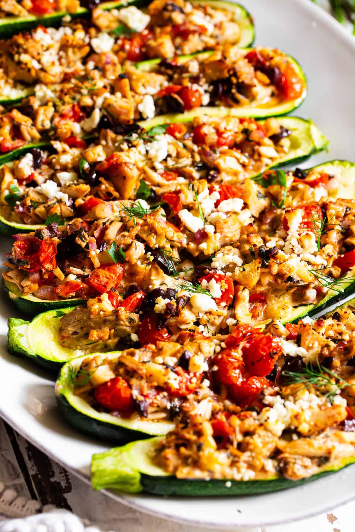 Rotisserie chicken filling with tomatoes, olives, zucchini, feta and Greek seasonings