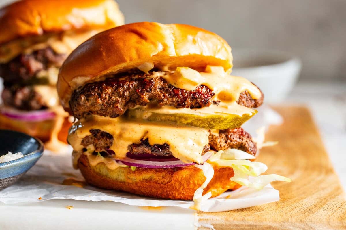 Easy double smash burgers with burger sauce served on toasted gluten-free buns.