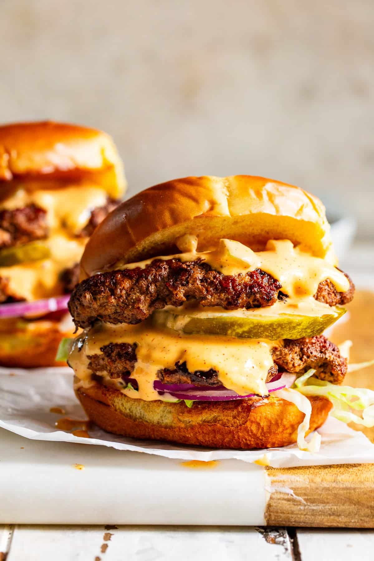 Easy double smash burgers with burger sauce served on toasted gluten-free buns.
