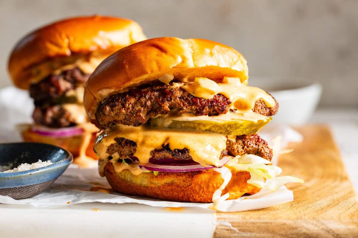 Easy double smash burgers with burger sauce served on toasted gluten-free buns.