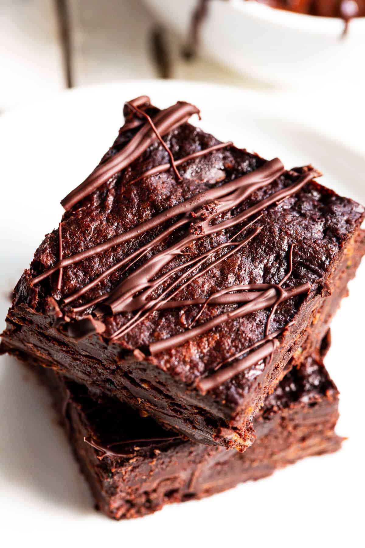 Stack of paleo zucchini brownies made with almond flour and dark chocolate