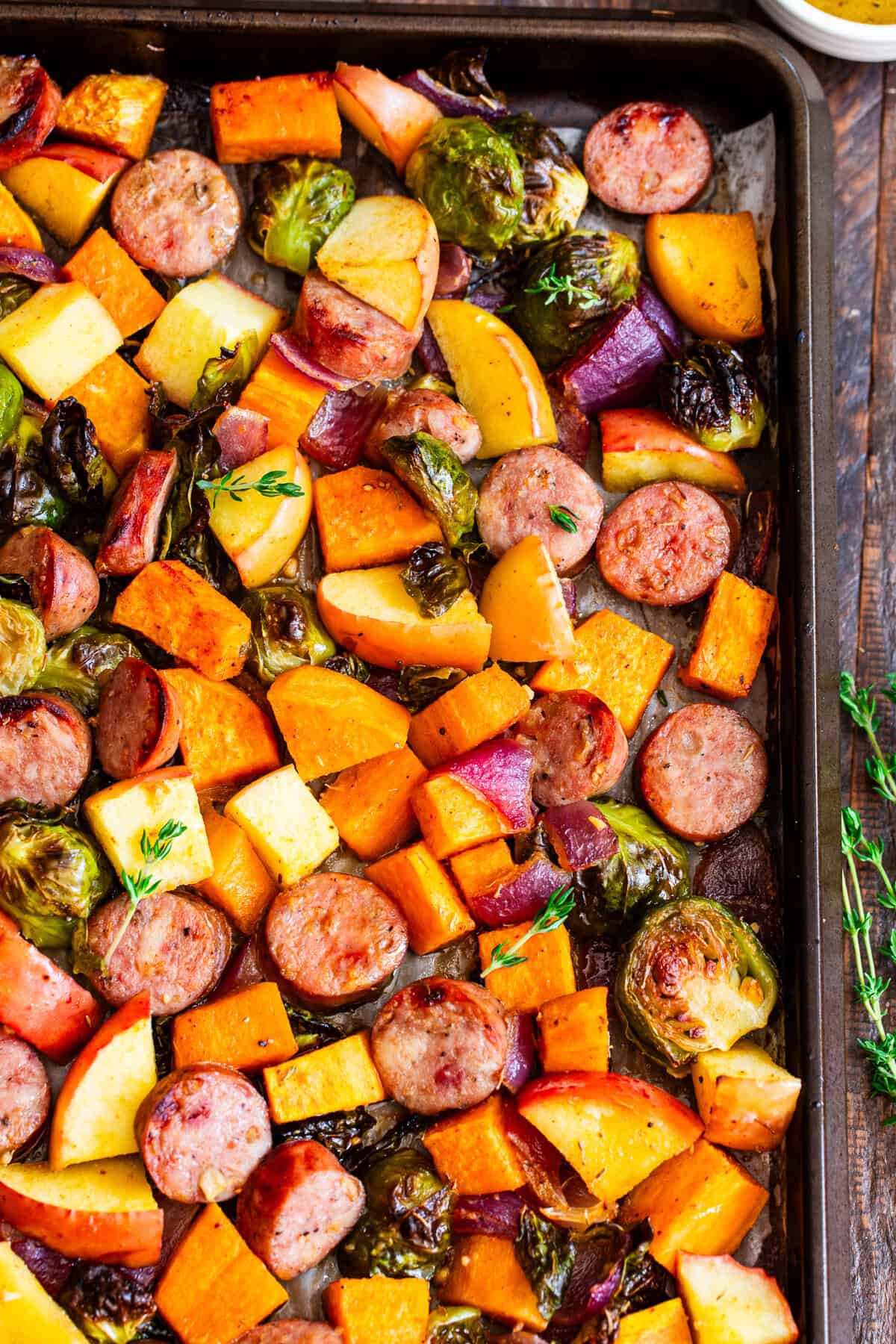 Chicken apple sausage sheet pan dinner with sweet potatoes, Brussels sprouts and apples
