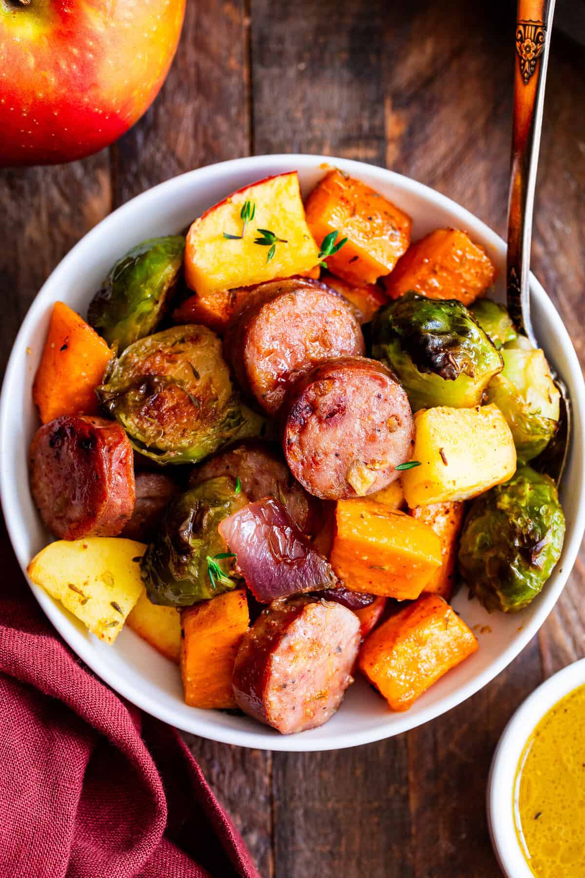 Chicken apple sausage sheet pan dinner with sweet potatoes, Brussels sprouts and apples