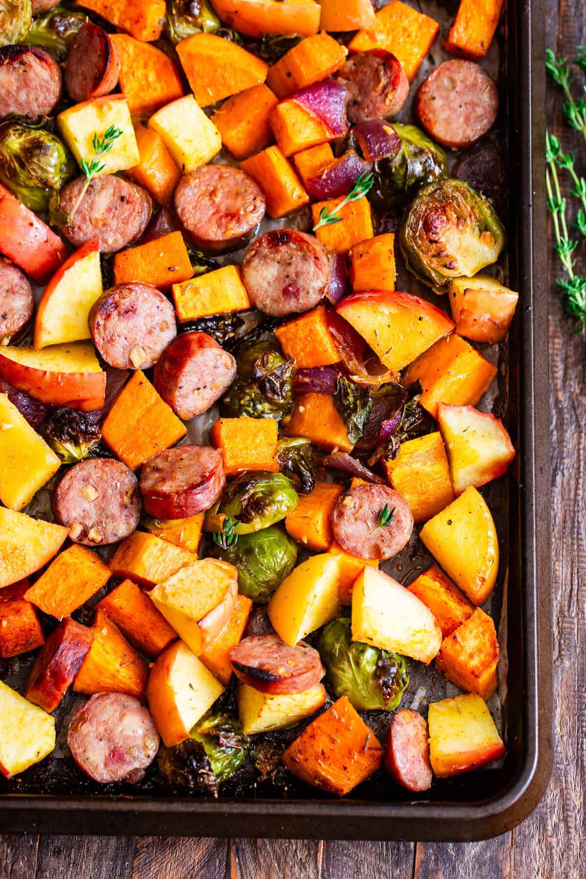 Chicken apple sausage sheet pan dinner with sweet potatoes, Brussels sprouts and apples