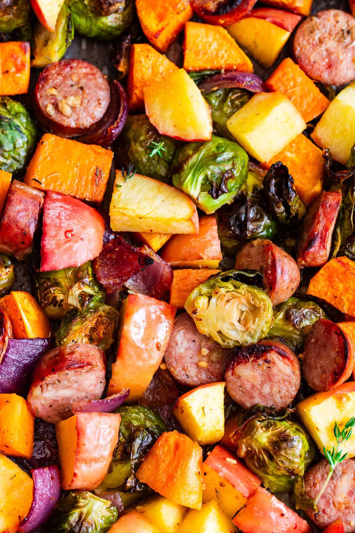 Chicken apple sausage sheet pan dinner with sweet potatoes, Brussels sprouts and apples